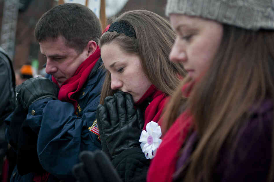 Participants silently pray at the March for Life rally.