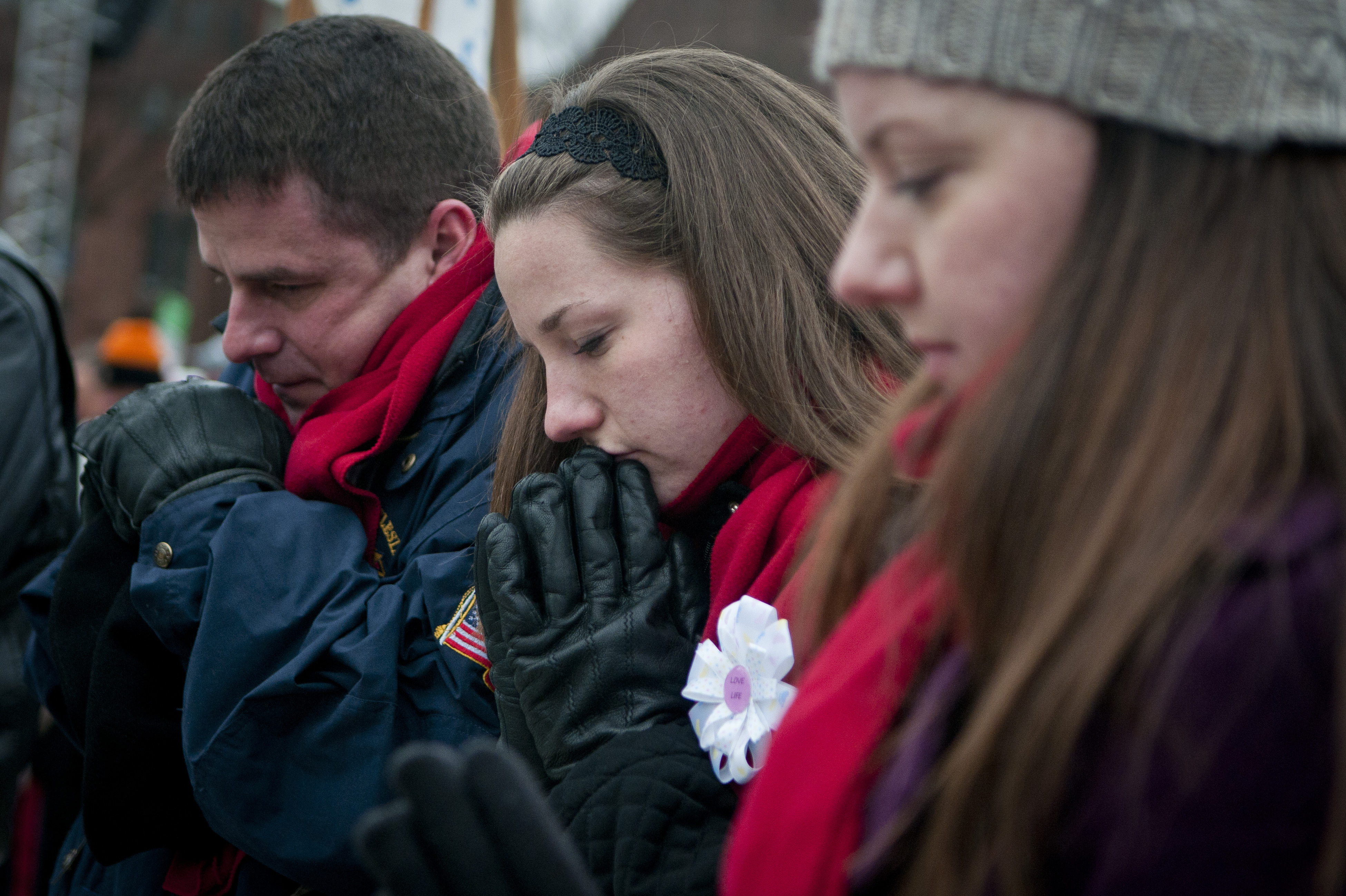 Participants silently pray at the March for Life rally.