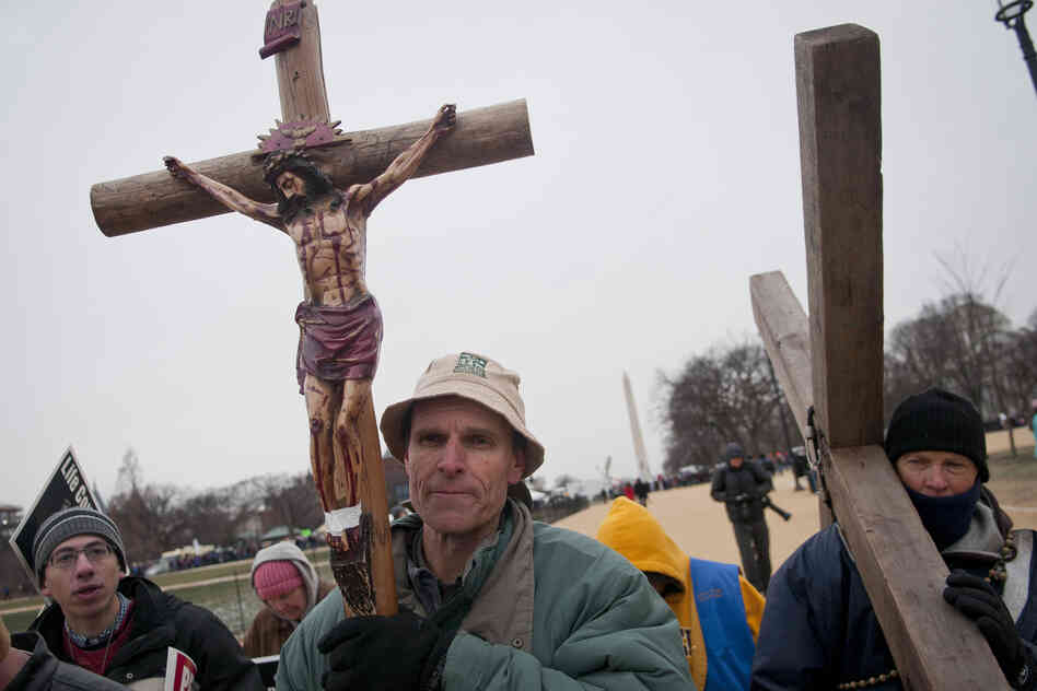Louisiana residents and members of Soliders for Christ under Our Lady of Guadalupe, carried crosses and recited the "Our Father" prayer during the March for Life rally.