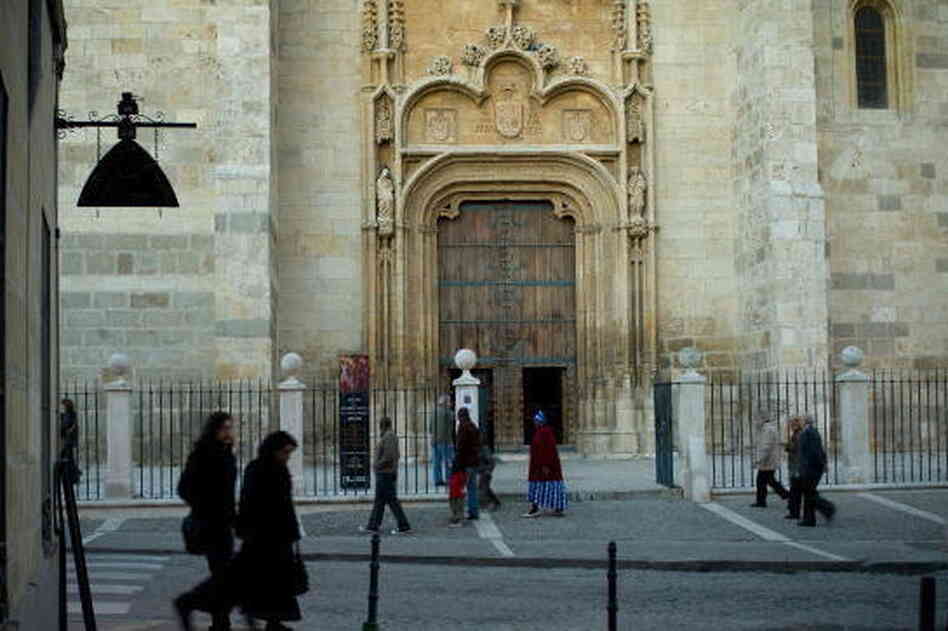 The Cathedral of Alcala de Henares is one of many buildings owned by the Catholic Church in Alcala de Henares, Spain. The town, which is outside Madrid, is broke and is pursuing a plan to have the church pay additional taxes.