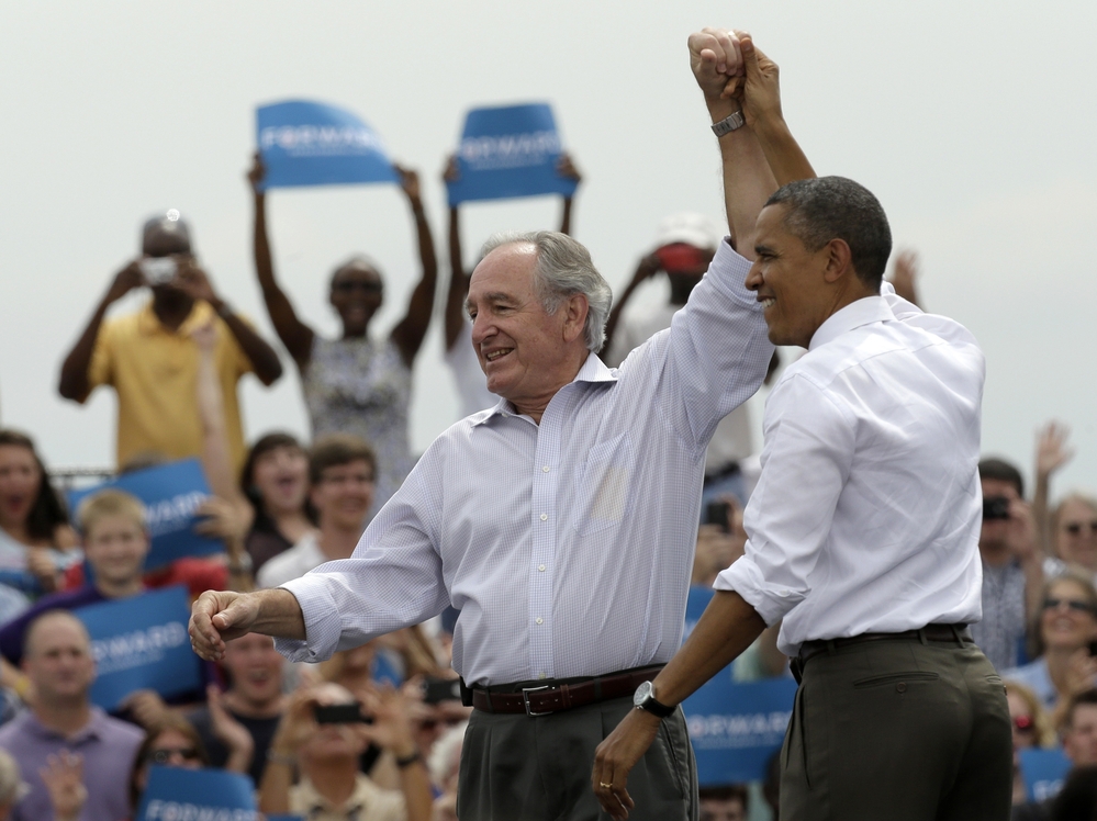 Sen. Tom Harkin, D-Iowa, campaigns with President Obama in Des Moines, Iowa, in September.