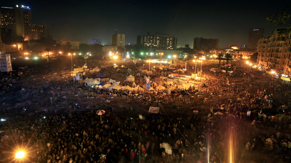 Thousands of Egyptian protesters gather in Tahrir Square in Cairo, Egypt, Friday, marking two years since the start of the country's revolution.