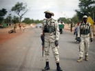 Malian soldiers man a checkpoint on the Gao road outside Sevare, some 385 miles north of Mali's capital, Bamako, on Sunday. Malian soldiers man a checkpoint on the Gao road outside Sevare, some 385 miles north of Mali's capital, Bamako, on Sunday.