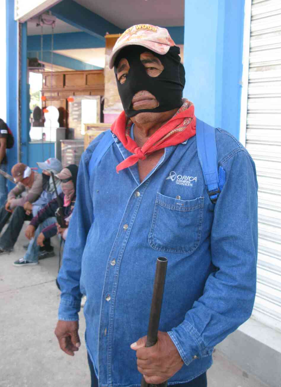 A man who identifies himself as a lower commander in Ayutla's self-defense brigade says residents had no choice but to take up arms. A man who identifies himself as a lower commander in Ayutla's self-defense brigade says residents had no choice but to take up arms.