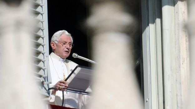 Pope Benedict XVI leads prayers on Nov. 27, 2011, in St. Peter's Square at the Vatican. The leader of the world's Roman Catholic Church called for a "responsible, credible and united response" to the problem of climate change. But in the U.S. at least, studies show the view even of religious Americans on climate change is much more likely to be shaped by their politics than their faith.