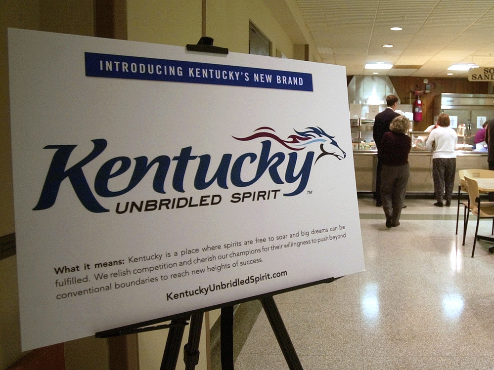 A display showing Kentucky's current logo and slogan, and explaining what it means, sits in the Capitol Annex cafeteria back in 2005.