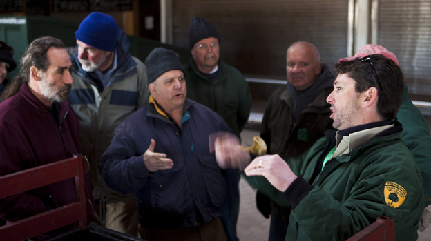 Ray Bukowski (far right), manager of Island Beach State Park, organizes members of the New Jersey Beach Buggy Association.
