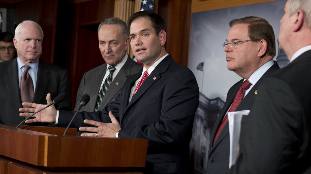 Five of the eight senators who proposed a bipartisan plan for an immigration overhaul attend a Capitol Hill news conference Monday. From left are John McCain of Arizona, Chuck Schumer of New York, Marco Rubio of Florida, Robert Menendez of New Jersey and Dick Durbin of Illinois.