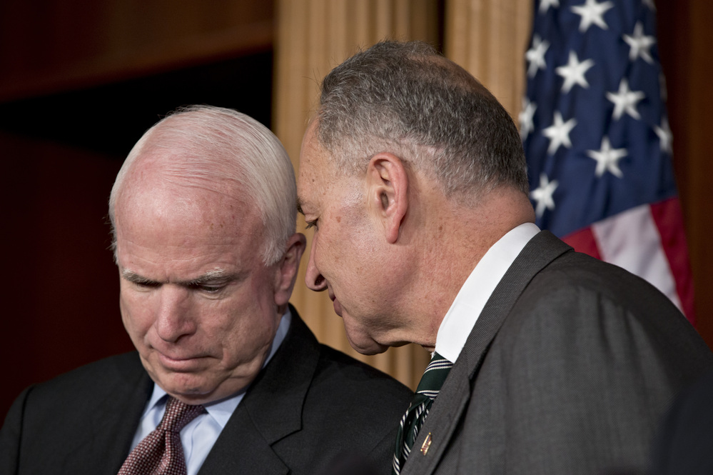 Sens. John McCain, R-Ariz., and Charles Schumer, D-N.Y., are closer on the immigration issue than McCain is to many in his party. They were among the eight senators who announced the framework for a bipartisan immigration overhaul on Monday.