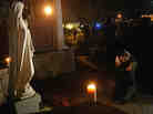 This photograph of Aline Marie praying outside St. Rose of Lima church in Newtown, Conn., has become the focus of a conversation surrounding ethics and photography on NPR's Picture Show blog. This photograph of Aline Marie praying outside St. Rose of Lima church in Newtown, Conn., has become the focus of a conversation surrounding ethics and photography on NPR's Picture Show blog.