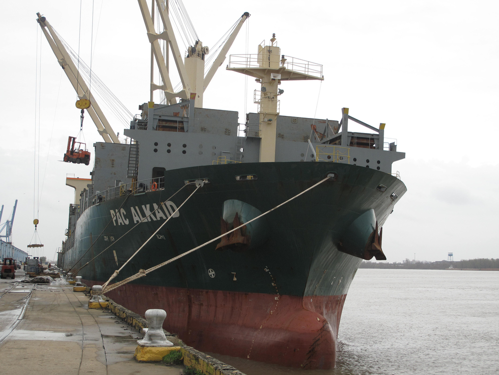 International ships call at the busy Port of New Orleans. It's a major shipping convergence point on the Mississippi River. Ships come upriver from the Gulf of Mexico with imports from abroad, and barges come downriver, bringing U.S. goods for export.