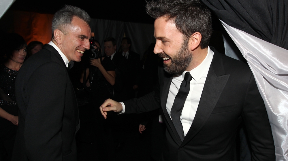 Daniel Day-Lewis, winner of the award for outstanding male actor in a leading role for Lincoln, left, and Ben Affleck, winner of the award for outstanding cast in a motion picture for Argo, speak backstage at the 19th Annual Screen Actors Guild Awards in Los Angeles on Sunday.