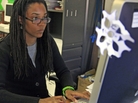 Nkomo Morris, a teacher at Brooklyn's Art and Media High School, works on her classroom computer in New York. Nkomo Morris, a teacher at Brooklyn's Art and Media High School, works on her classroom computer in New York.