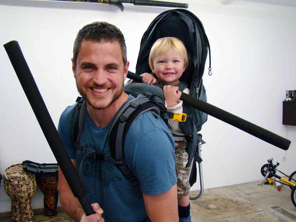 Sam Sheridan, shown here with his son Asa, is an amateur boxer and MMA fighter. He has worked in construction in Antarctica and as a cowboy and farmhand in Montana.