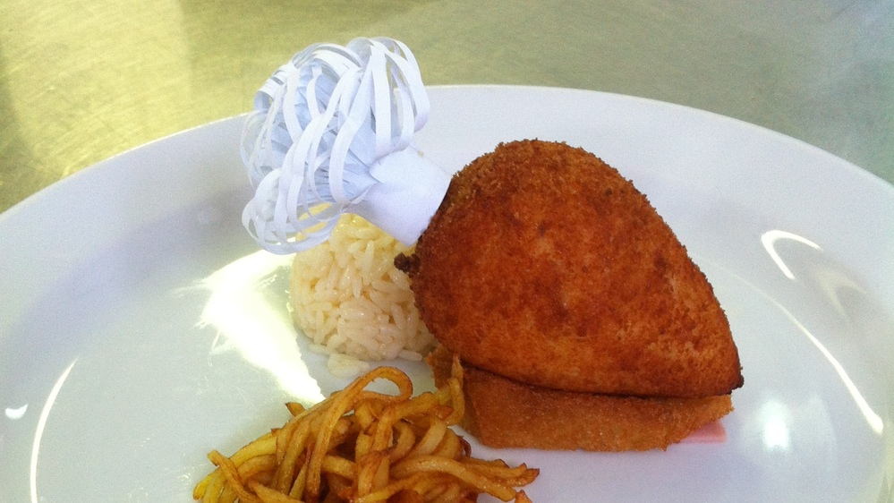 Chicken Kiev made by Viacheslav Gribov, head chef at Kiev's Hotel Dnipro, comes with a small bone sticking out one end. If done properly, some of the butter inside will remain unmelted.