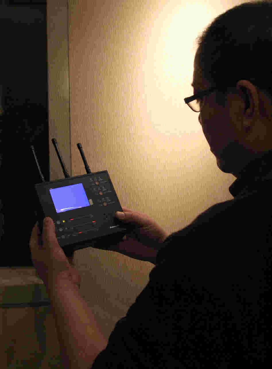 Qi Hong, a former journalist, says he has helped more than a hundred friends find more than 300 surveillance devices, including audio bugs and hidden cameras.