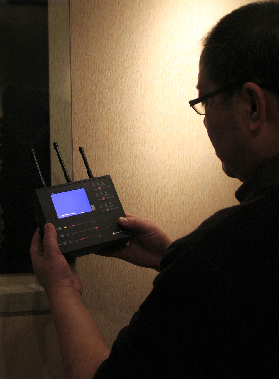 Qi Hong, a former journalist, says he has helped more than a hundred friends find more than 300 surveillance devices, including audio bugs and hidden cameras.