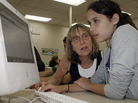 Palo Alto High School teacher Esther Wojcicki helps student Allison Wyndham at a computer during class. Palo Alto High School teacher Esther Wojcicki helps student Allison Wyndham at a computer during class.
