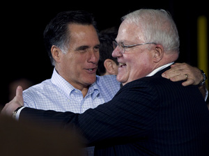 GOP Rep. James Sensenbrenner of Wisconsin (right) greeted former Republican presidential hopeful Mitt Romney at a campaign event last spring. Sensenbrenner sponsored a controversial 2005 House bill on immigration.