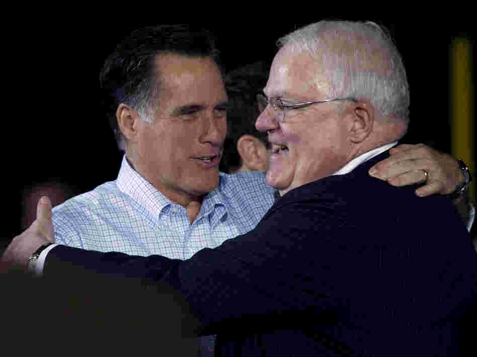 GOP Rep. James Sensenbrenner of Wisconsin (right) greeted former Republican presidential hopeful Mitt Romney at a campaign event last spring. Sensenbrenner sponsored a controversial 2005 House bill on immigration.