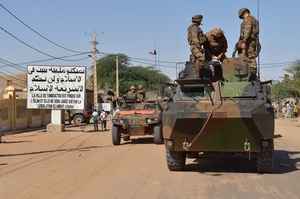 A French military convoy crosses Timbuktu on Tuesday.