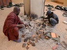 Men recover burnt ancient manuscripts at the Ahmed Baba Institute in Timbuktu on Tuesday. Men recover burnt ancient manuscripts at the Ahmed Baba Institute in Timbuktu on Tuesday.