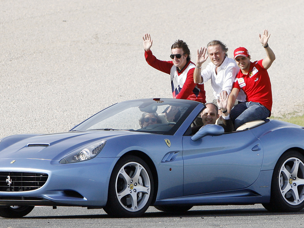 In 2009, Formula One driver Fernando Alonso (from left), Ferrari President Luca Cordero di Montezemolo and Ferrari F1 driver Felipe Massa ride in a Ferrari driven by Valencia's then-regional government president Francisco Camps.