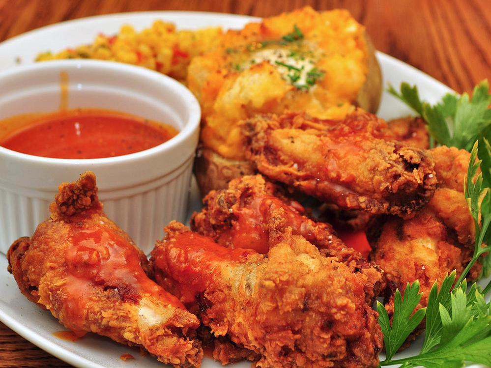 Blame sports bars for the chicken wing boom, especially on Super Bowl Sunday.