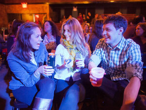 Ask Me Another audience members enjoy some potent potables from The Bell House's esteemed bartenders. Ask Me Another audience members enjoy some potent potables from The Bell House's esteemed bartenders.