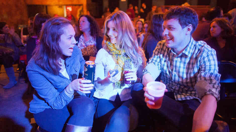 Ask Me Another audience members enjoy some potent potables from The Bell House's esteemed bartenders. Ask Me Another audience members enjoy some potent potables from The Bell House's esteemed bartenders.