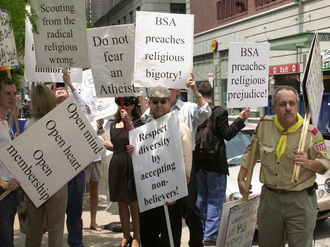 The Supreme Court upheld the Boy Scouts' right to discriminate in 2000, but the issue roiled for years after. Scott Cozza (right) leads a protest outside the National Council Conference of the Boy Scouts of America in Philadelphia in 2003.