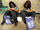Looking for work: In Birmingham, Ala., last summer, Jessica McQueen (left) and Ashley Abramson were among those filling out applications at a jobs fair. Looking for work: In Birmingham, Ala., last summer, Jessica McQueen (left) and Ashley Abramson were among those filling out applications at a jobs fair.