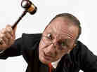 A furious judge slams his gavel.