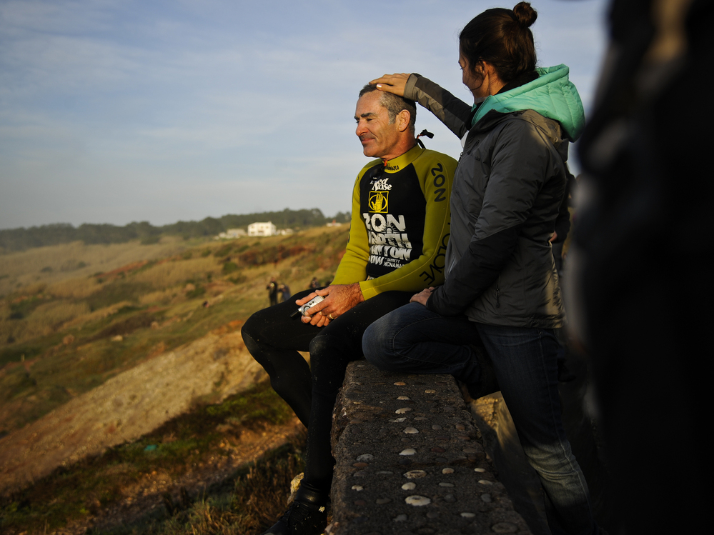 McNamara sits next to his wife, Nicole, after a surf session in Nazare a day after riding the massive wave.