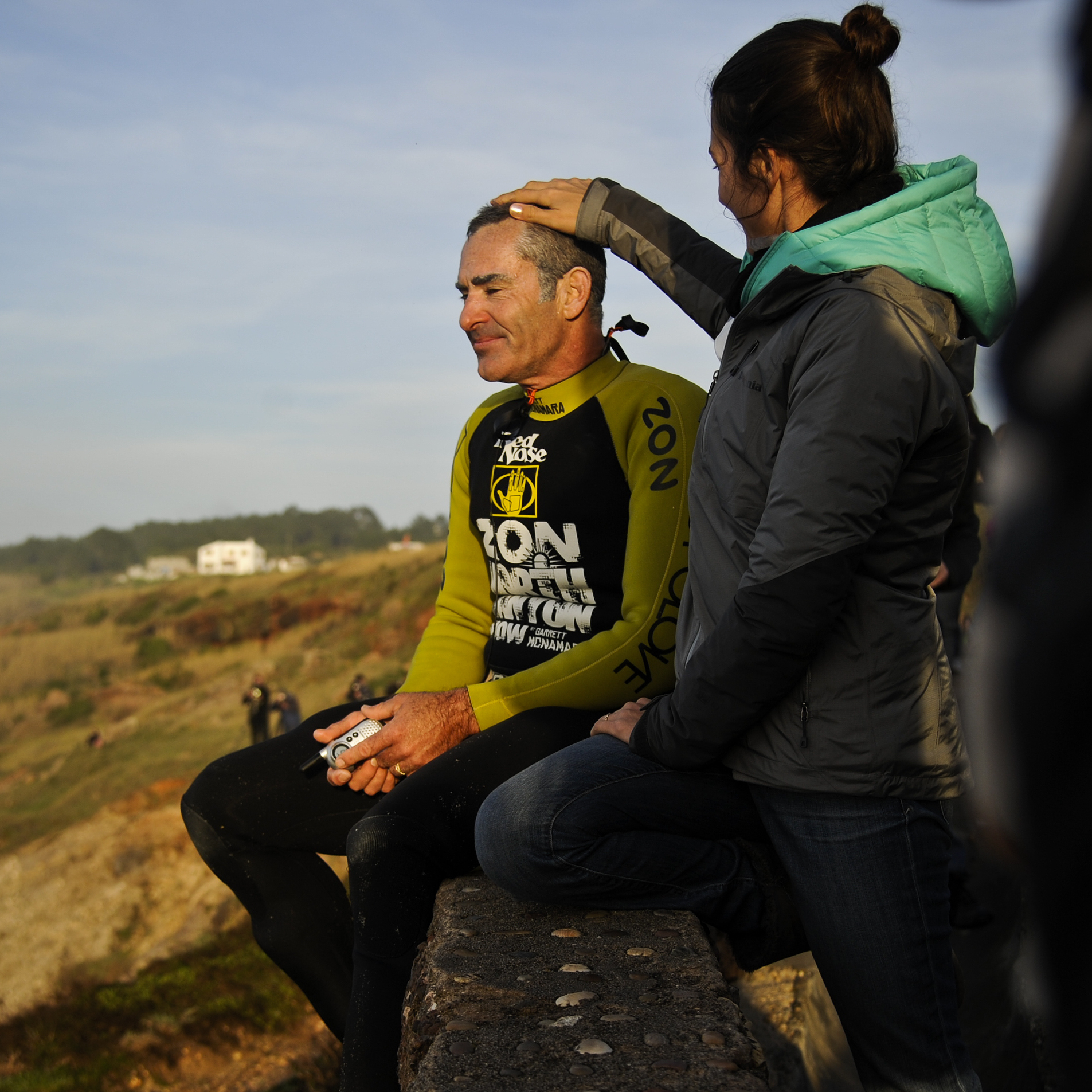 McNamara sits next to his wife, Nicole, after a surf session in Nazare a day after riding the massive wave.
