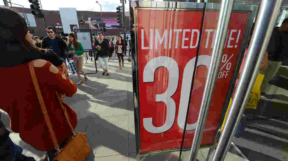 Consumer spending rose in 2012, but not by as much as the year before. In December, these shoppers were out and about in Glendale, Calif.