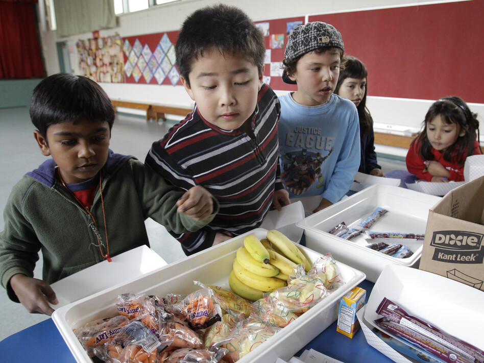 The U.S. Department of Agriculture's proposed new rules for school snacks promote healthier options, like the fruits and vegetables served in this Palo Alto, Calif., cafeteria.
