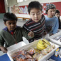 The U.S. Department of Agriculture's proposed new rules for school snacks promote healthier options, like the fruits and vegetables served in this Palo Alto, Calif., cafeteria.