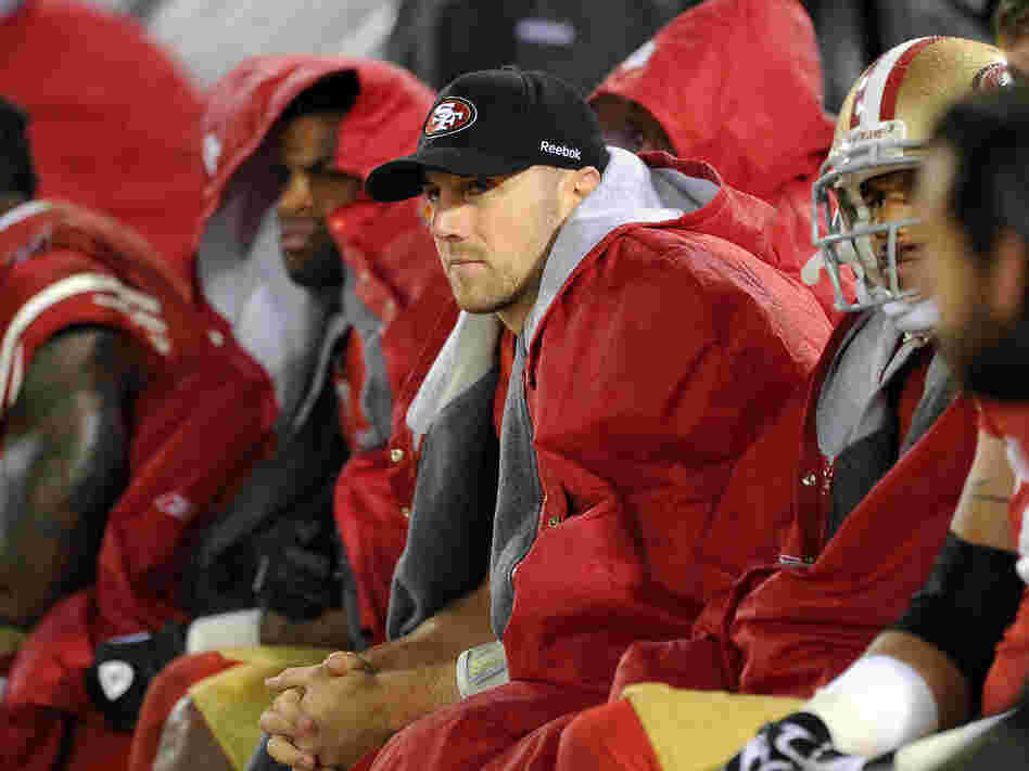 San Francisco 49ers quarterback Alex Smith looks on from the sidelines during the overtime period against the New York Giants on Jan. 22, 2012, in San Francisco.