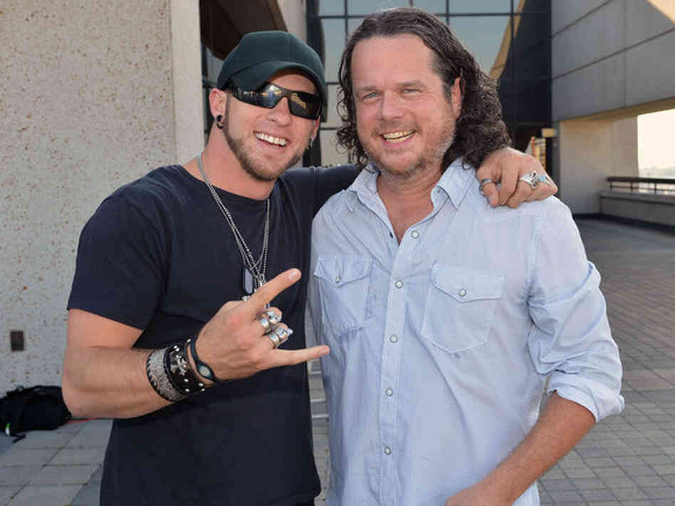 McCormick (right) with singer-songwriter Brantley Gilbert. Gilbert's song "You Don't Know Her Like I Do," which McCormick co-wrote, hit the top of Billboard's Hot Country Songs chart in the summer of 2012.