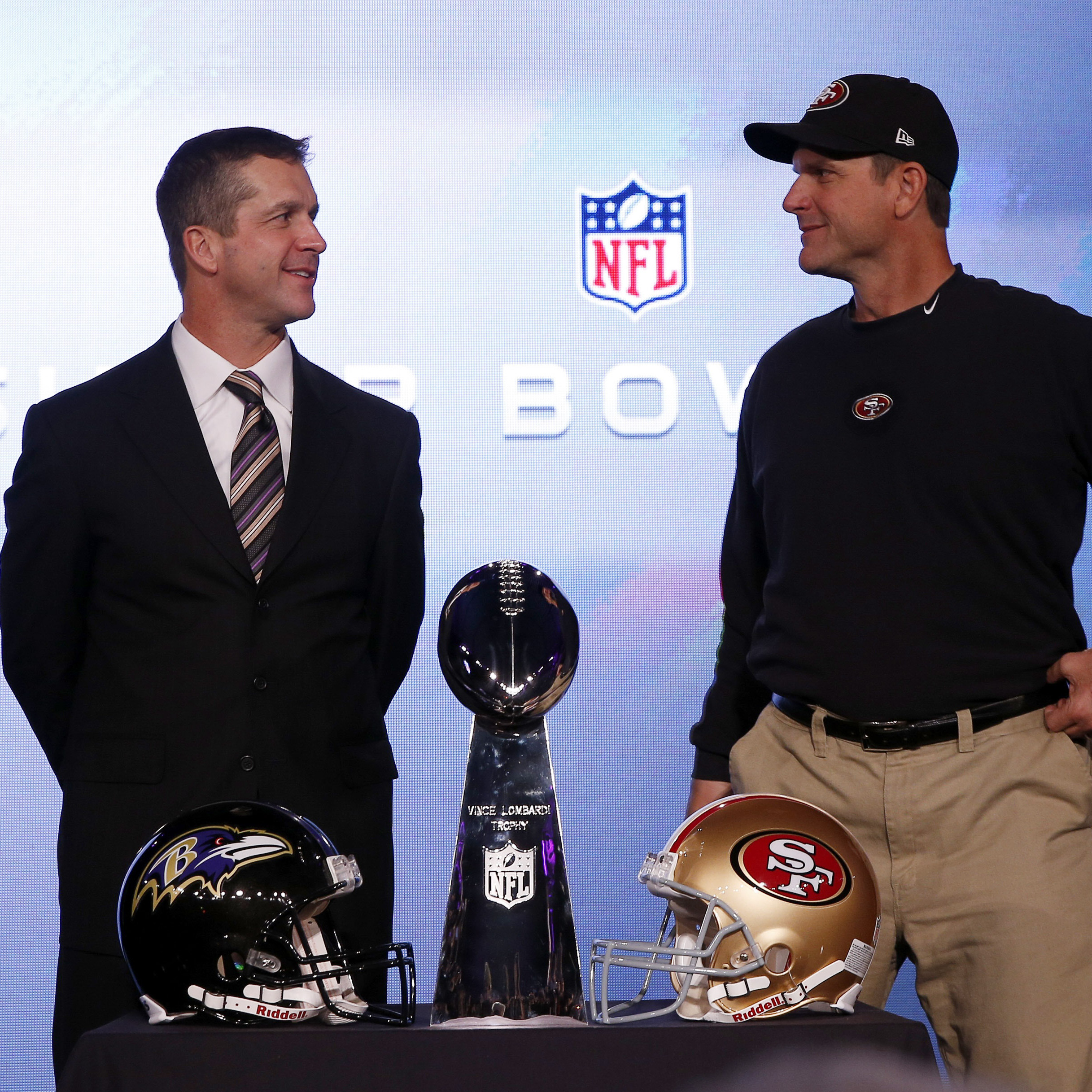 San Francisco 49ers head coach Jim Harbaugh (right) and his brother, Baltimore Ravens head coach John Harbaugh, with the Vince Lombardi trophy ahead of the NFL's Super Bowl XLVII in New Orleans.