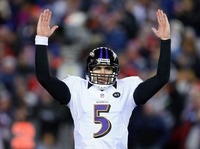 Quarterback Joe Flacco of the Baltimore Ravens celebrates after a touchdown against the New England Patriots during the 2013 AFC Championship on Jan. 20.