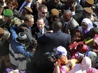 French President Francois Hollande is surrounded by well-wishers on his short visit to Timbuktu, Mali, on Saturday. French President Francois Hollande is surrounded by well-wishers on his short visit to Timbuktu, Mali, on Saturday.
