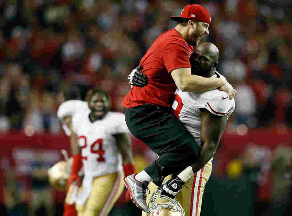Practice squad player Nate Stupar and guard Leonard Davis of the San Francisco 49ers celebrate during the NFC Championship game on January 20. Practice squad player Nate Stupar and guard Leonard Davis of the San Francisco 49ers celebrate during the NFC Championship game on January 20.