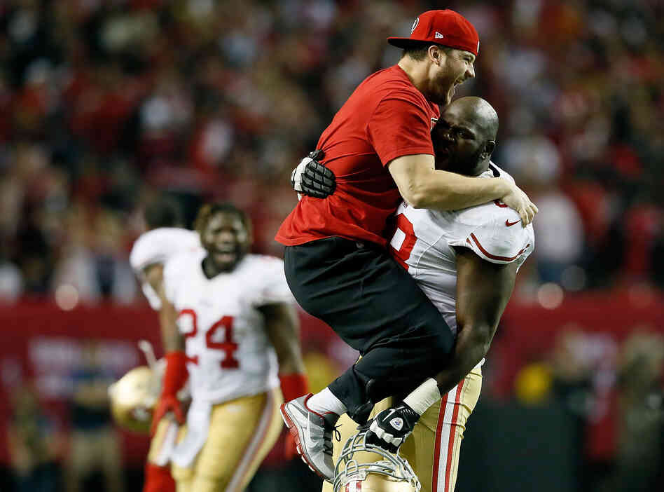 Practice squad player Nate Stupar and guard Leonard Davis of the San Francisco 49ers celebrate during the NFC Championship game on January 20. Practice squad player Nate Stupar and guard Leonard Davis of the San Francisco 49ers celebrate during the NFC Championship game on January 20.