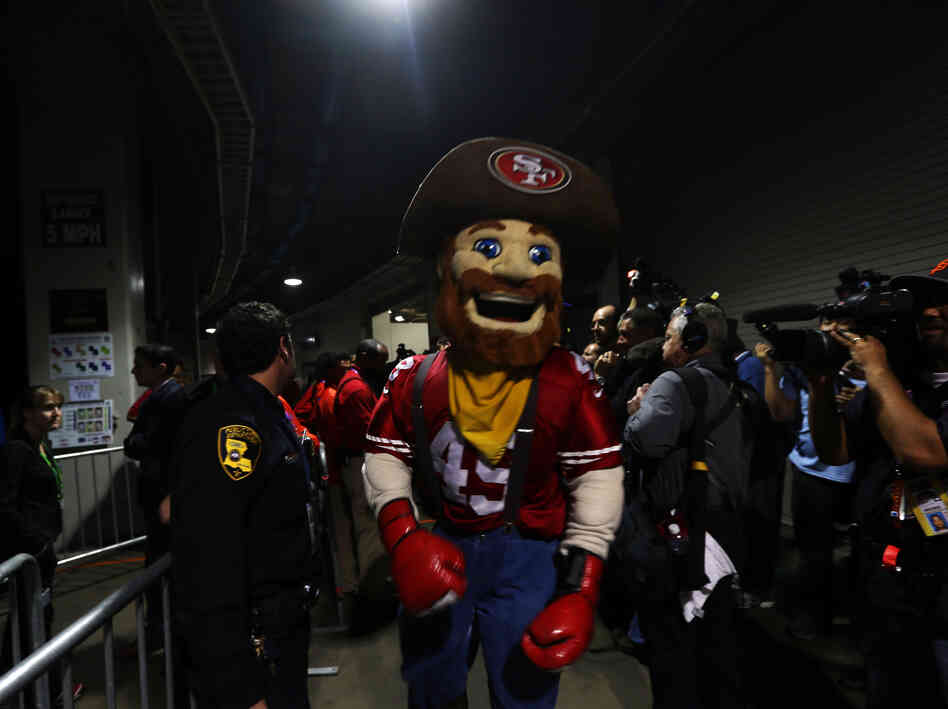 The San Francisco 49ers mascot stands in the tunnel during the power outage. Please imagine his instructions: "Even in case of emergency, the foam head STAYS ON." The San Francisco 49ers mascot stands in the tunnel during the power outage. Please imagine his instructions: "Even in case of emergency, the foam head STAYS ON."