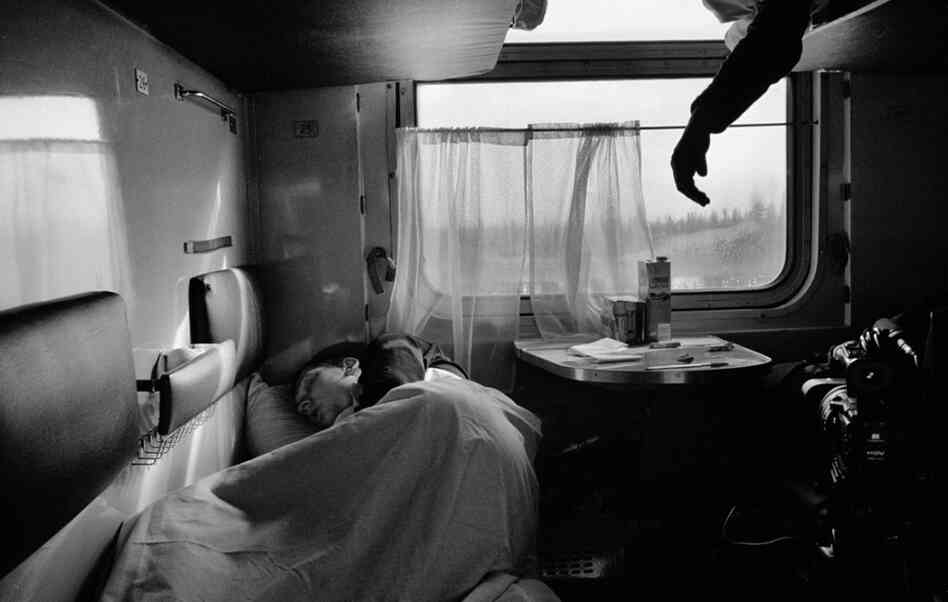 A young coal miner sleeps on the train. The ride from Moscow to the coal mines in the Arctic Circle can take 40 hours.
