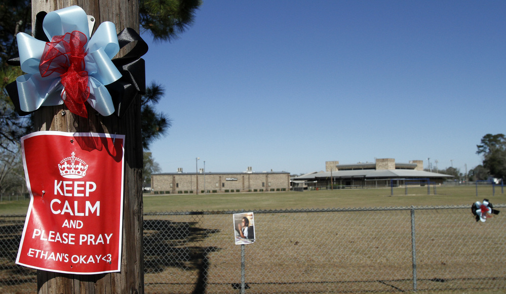 Posters for Ethan decorate power poles all over town, like this one outside the elementary school in Midland City, Ala.