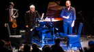 Conductor and pianist Daniel Barenboim (center) brought members of his West-Eastern Divan Orchestra (including his son Michael Barenboim, left, and Kinan Azmeh) to the intimate spaces of Manhattan's Le Poisson Rouge. Conductor and pianist Daniel Barenboim (center) brought members of his West-Eastern Divan Orchestra (including his son Michael Barenboim, left, and Kinan Azmeh) to the intimate spaces of Manhattan's Le Poisson Rouge.