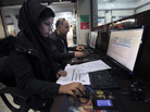 Iranian authorities are using cyberpolice units to crack down on people who try to access banned websites, including social media sites such as Facebook. Here, Iranians use computers at an Internet cafe in Tehran in January. Iranian authorities are using cyberpolice units to crack down on people who try to access banned websites, including social media sites such as Facebook. Here, Iranians use computers at an Internet cafe in Tehran in January.
